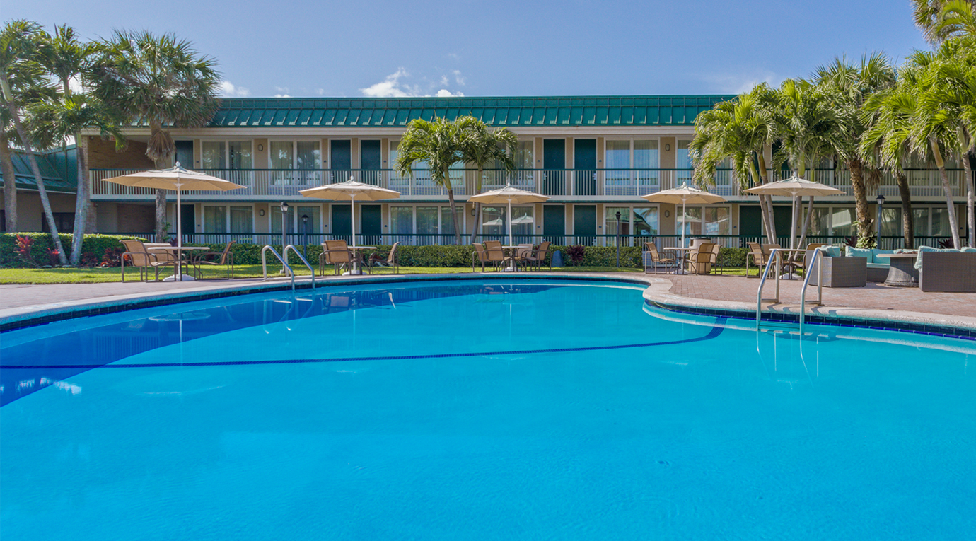 hotel pool and with tables