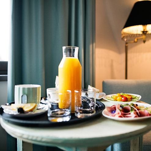 table with appetizers and OJ on a table