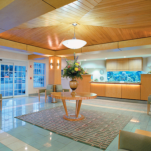 A lobby with a fish tank.