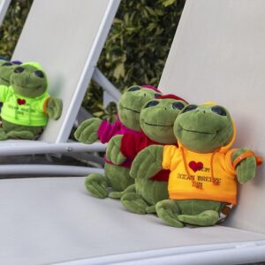 Ocean Breeze Inn Vero turtle stuffed animals on pool chairs